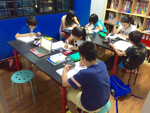 PSLE Student doing Mathematics MOE SEAB Syllabus Singapore in Tampines Tuition Centre Class